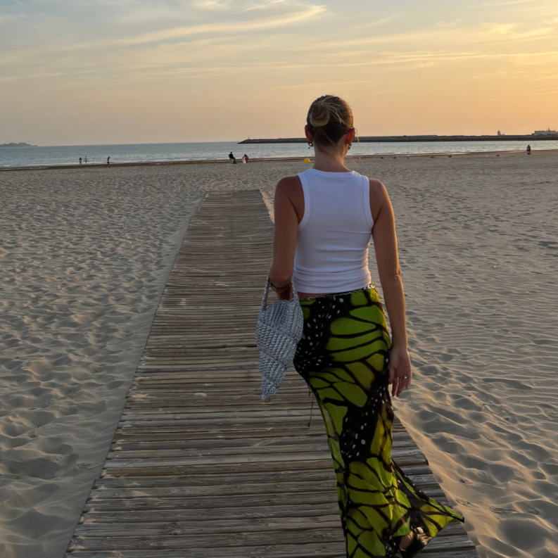 crochet shell bag at the beach